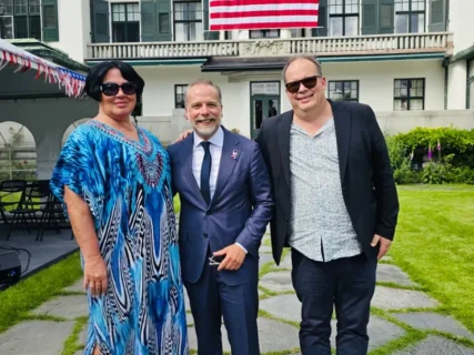 Annie Schur and Robert Schur with Acting Deputy Chief of Mission Jamal Al-Mussawi at the U.S. Embassy in Oslo during 4th of July celebrations.