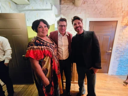 Annie Schur with Johann Olav Koss and Jan Thomas at a gathering in Oslo